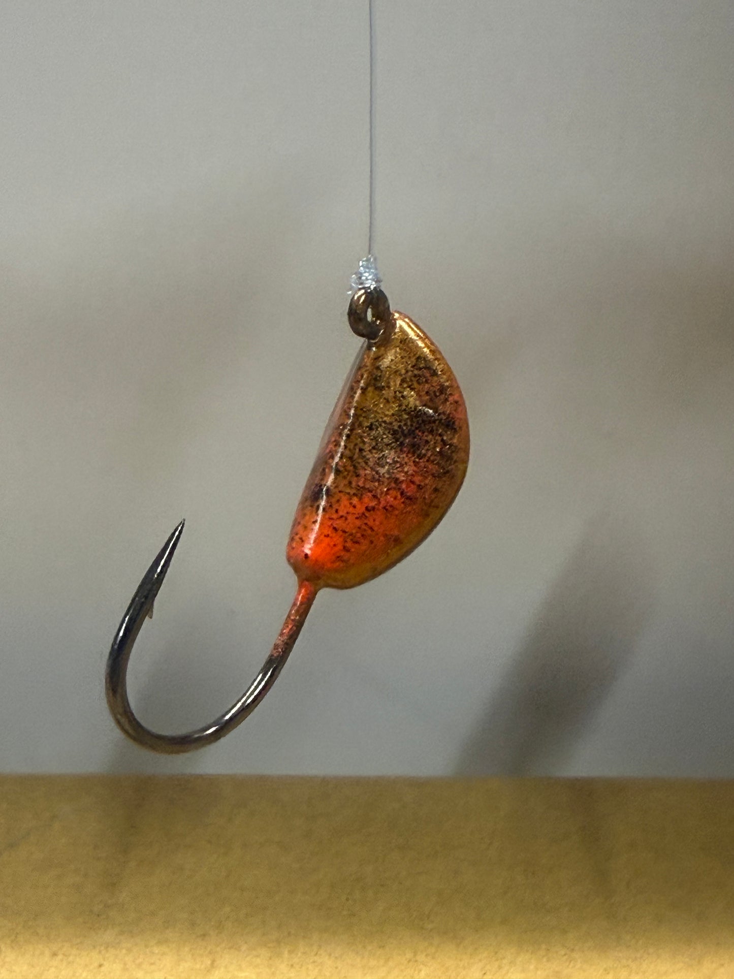 Sandy base with accents of orange and black.